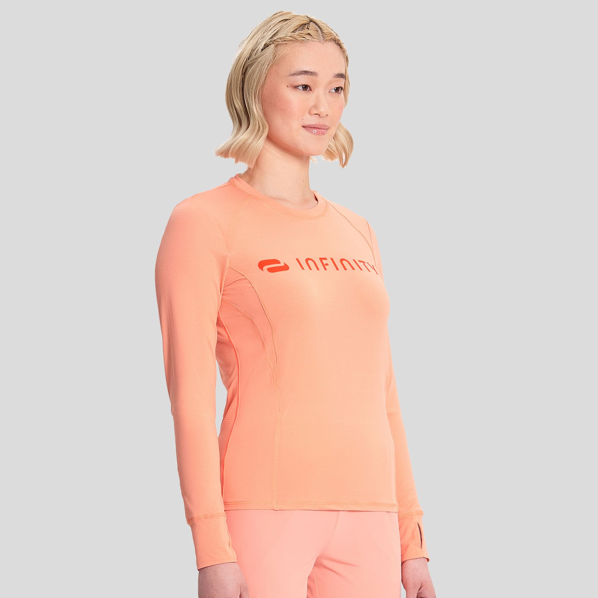 IN_INFINITY_GNR8_LOGOPERFORMANCEUNDERSCRUB_641_ELECTRICCORAL_RIGHT3